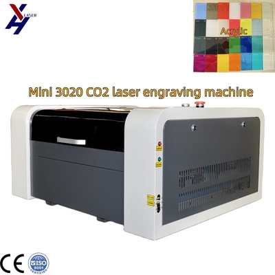 เครื่องพิมพ์เลเซอร์ 3 มิติ CNC เครื่องฉลากเลเซอร์ที่มีหลอดเลเซอร์ CO2 สําหรับผ้าไม้อะคริลิก